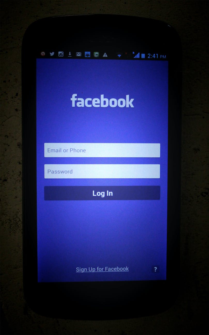black samsung android smartphone showing facebook mobile application